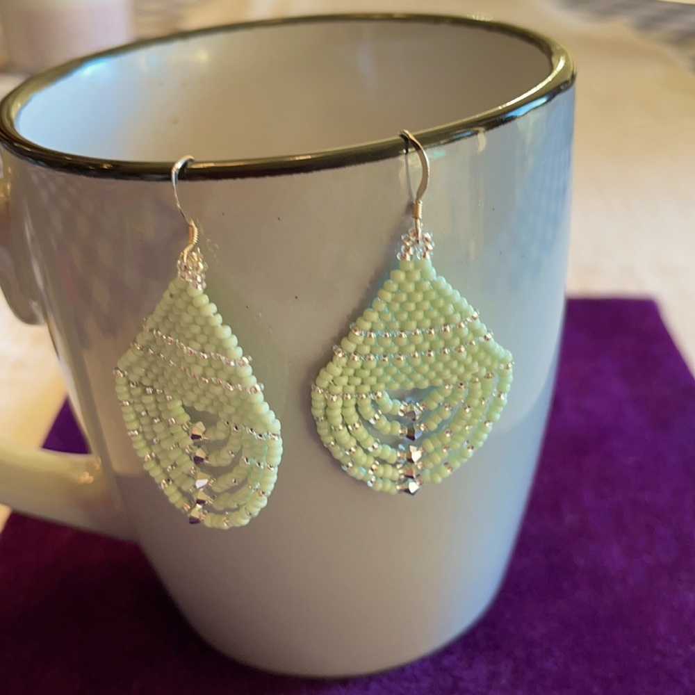 Hand made beaded tear drop earrings.